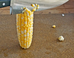 cutting corn off the cob